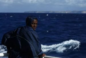 Migrant Stands On Deck, Darrin Zammit Lupi. Used with permission.