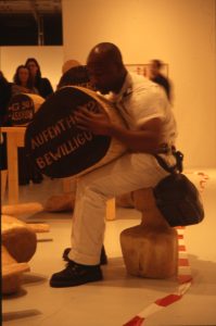 Barthélémy Toguo performing The New World Climax, 2011, courtesy of the artist
